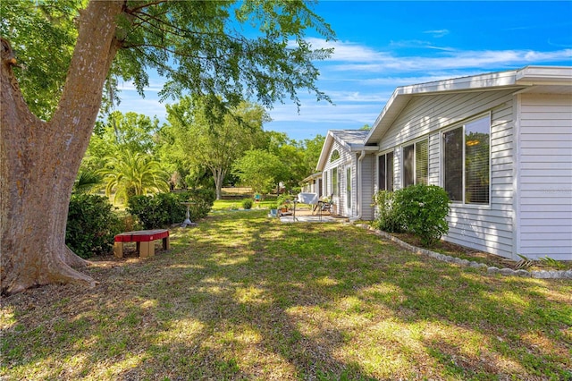 10989 SW 86th Ave, Ocala, FL 34481 - view of yard featuring a patio area