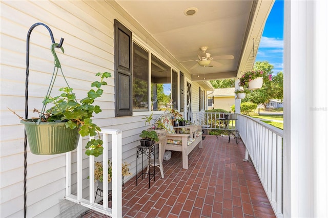 10989 SW 86th Ave, Ocala, FL 34481 - balcony featuring a ceiling fan and a porch