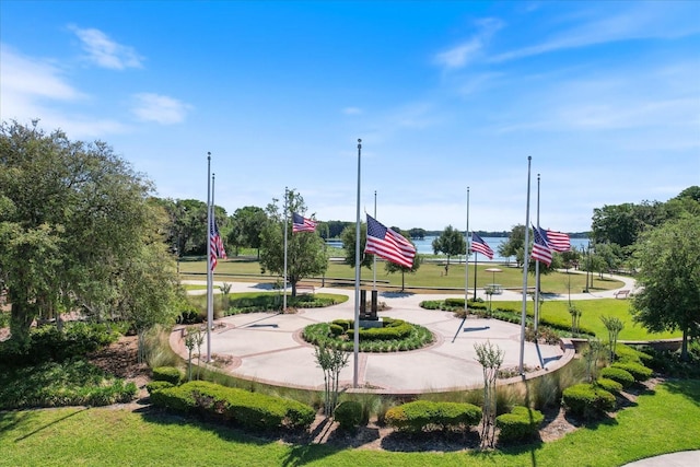 surrounding community featuring a yard