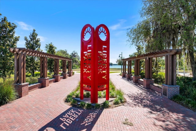 view of property's community featuring a pergola