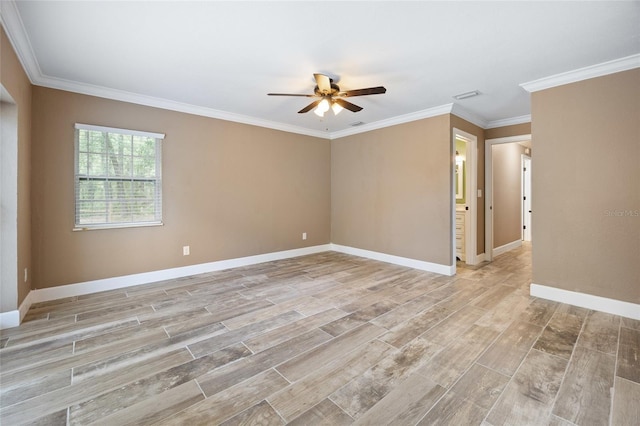 empty room with a ceiling fan, visible vents, baseboards, light wood finished floors, and ornamental molding
