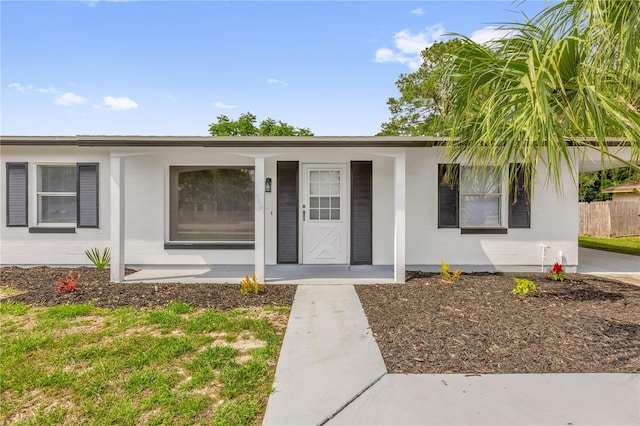 3807 SW 143rd Lane Rd, Ocala, FL 34473 - view of front of house featuring a porch and concrete block siding