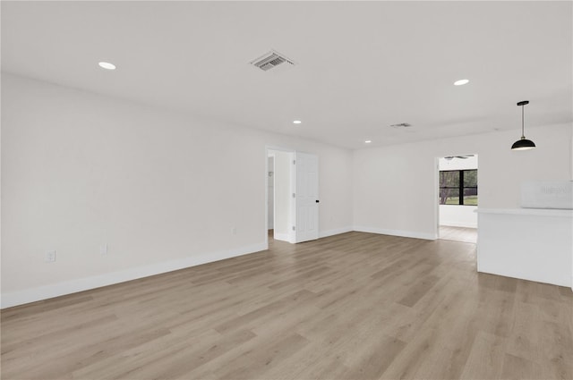 3807 SW 143rd Lane Rd, Ocala, FL 34473 - empty room featuring light wood finished floors, recessed lighting, and baseboards