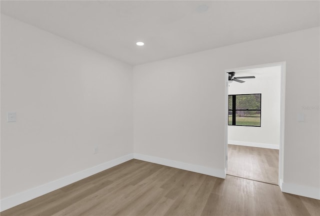 3807 SW 143rd Lane Rd, Ocala, FL 34473 - empty room with wood finished floors, baseboards, ceiling fan, and recessed lighting
