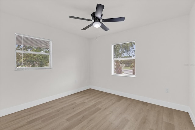 3807 SW 143rd Lane Rd, Ocala, FL 34473 - unfurnished room with baseboards, light wood finished floors, and a ceiling fan