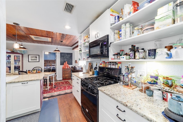 kitchen with open shelves, wood finished floors, black appliances, wooden ceiling, and visible vents