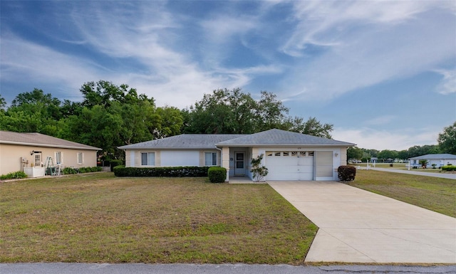 6150 SW 103rd Loop, Ocala, FL 34476 - single story home with stucco siding, driveway, a front yard, and a garage