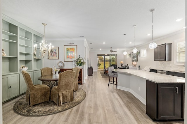6816 SW 95th Cir, Ocala, FL 34481 - dining area featuring recessed lighting, light wood-style flooring, ornamental molding, ceiling fan with notable chandelier, and baseboards