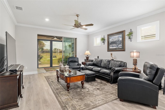 6816 SW 95th Cir, Ocala, FL 34481 - living room featuring a ceiling fan, crown molding, light wood-type flooring, baseboards, and visible vents