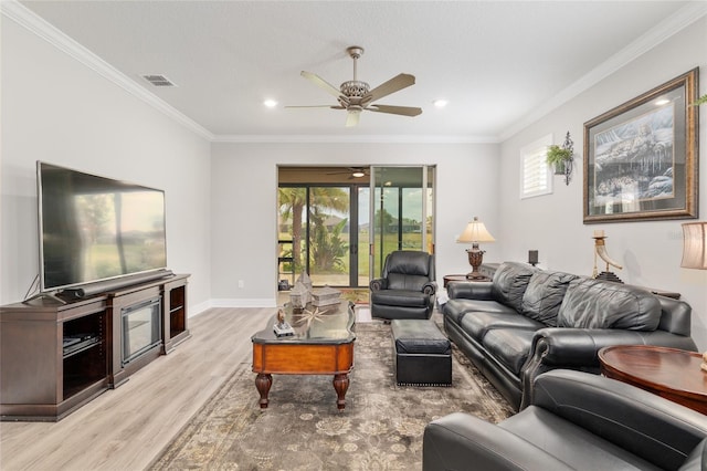 6816 SW 95th Cir, Ocala, FL 34481 - living area with a ceiling fan, crown molding, visible vents, and light wood-style flooring