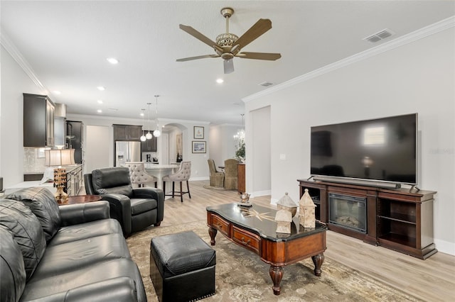 6816 SW 95th Cir, Ocala, FL 34481 - living room featuring recessed lighting, light wood finished floors, visible vents, ornamental molding, and ceiling fan