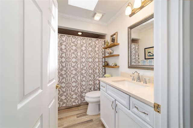 full bath with a shower with curtain, toilet, wood finished floors, crown molding, and vanity
