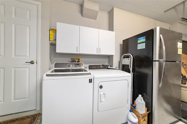 clothes washing area featuring washing machine and dryer