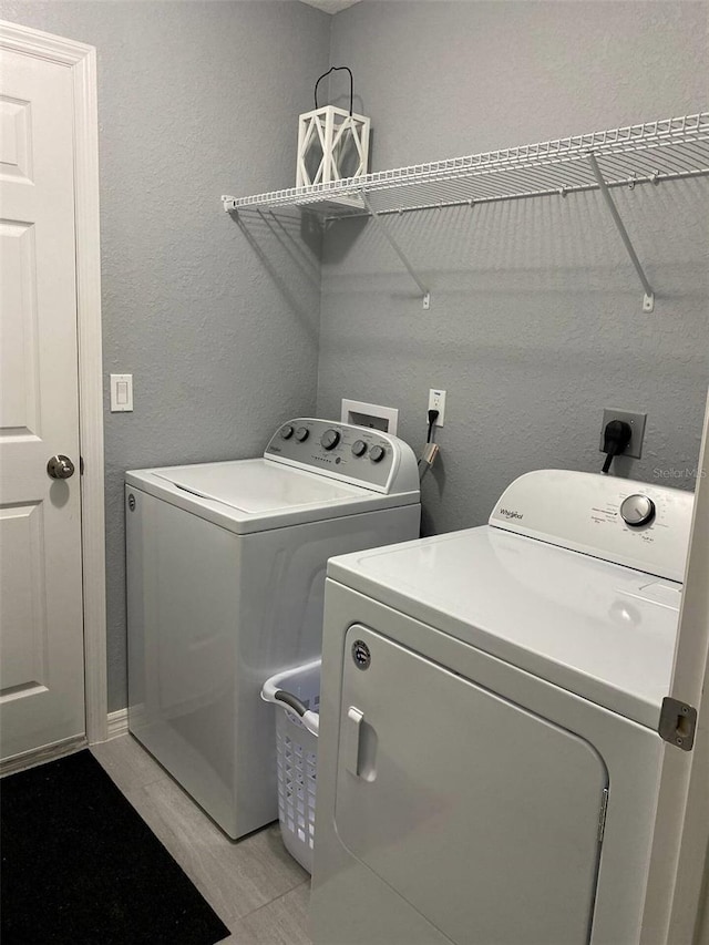 6432 NW 64th Ter, Ocala, FL 34482 - washroom with washer and clothes dryer