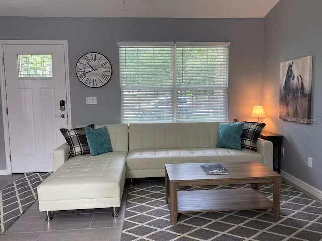 6432 NW 64th Ter, Ocala, FL 34482 - living area with baseboards and tile patterned floors
