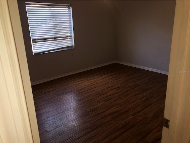 9896 SW 61st Ct, Ocala, FL 34476 - empty room featuring baseboards and dark wood finished floors