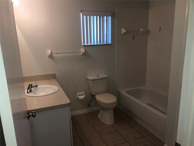 9896 SW 61st Ct, Ocala, FL 34476 - full bathroom featuring vanity, bathing tub / shower combination, toilet, baseboards, and tile patterned floors