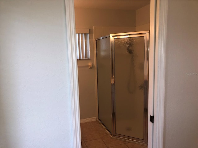 9896 SW 61st Ct, Ocala, FL 34476 - full bathroom with a shower stall and tile patterned flooring
