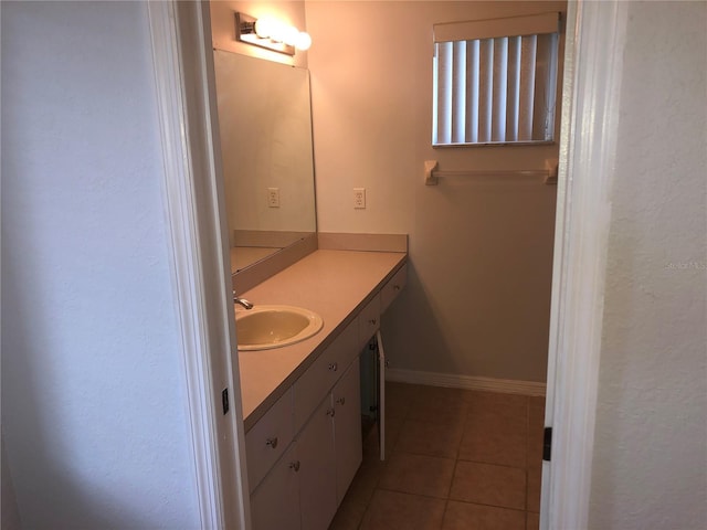 9896 SW 61st Ct, Ocala, FL 34476 - bathroom featuring tile patterned floors and vanity