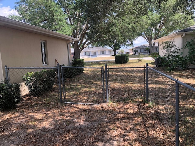 9896 SW 61st Ct, Ocala, FL 34476 - view of yard featuring fence and a gate