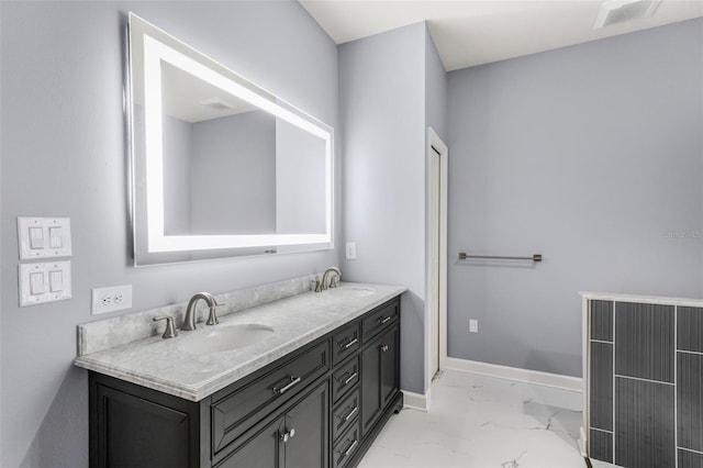 full bathroom with double vanity, visible vents, marble finish floor, and a sink