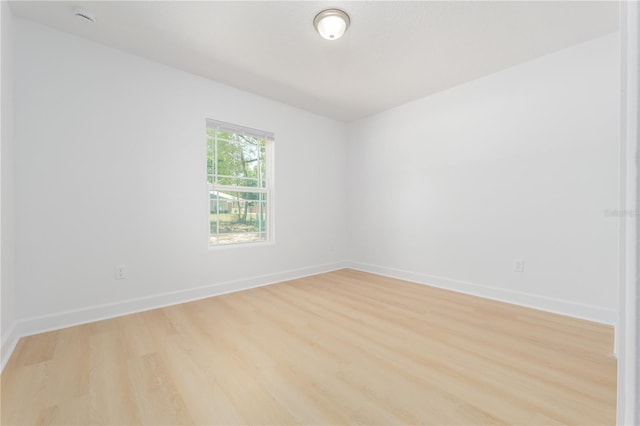 1074 SE 52nd St, Keystone Heights, FL 32656 - unfurnished room featuring baseboards and light wood-type flooring