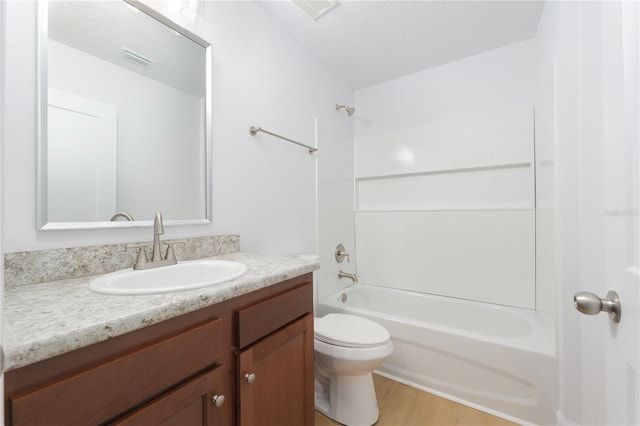 1074 SE 52nd St, Keystone Heights, FL 32656 - full bathroom with toilet, visible vents, vanity, and shower / bathing tub combination