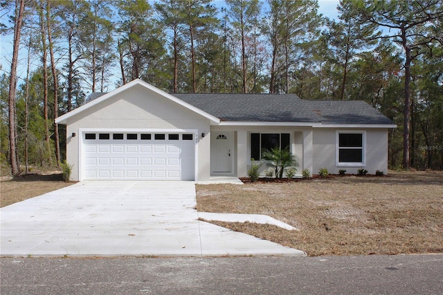 ranch-style home featuring roof with shingles, an attached garage, stucco siding, and driveway