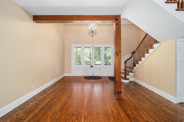 950 SW 43rd Pl, Ocala, FL 34471 - entrance foyer featuring baseboards, beam ceiling, stairs, and wood finished floors