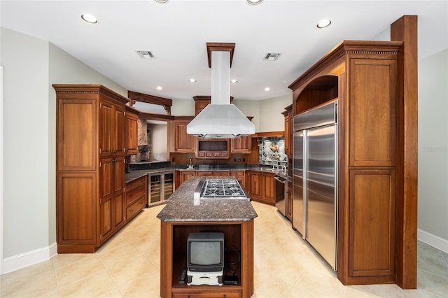 950 SW 43rd Pl, Ocala, FL 34471 - kitchen featuring visible vents, appliances with stainless steel finishes, open shelves, dark stone countertops, and beverage cooler