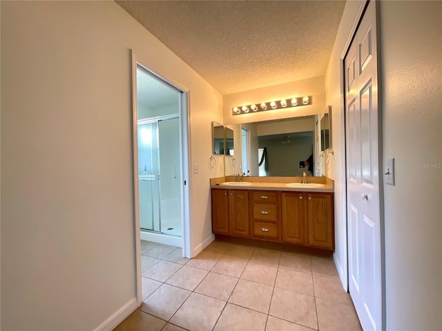 15782 SW 16th Avenue Rd, Ocala, FL 34473 - full bathroom featuring tile patterned flooring, a sink, double vanity, and a stall shower