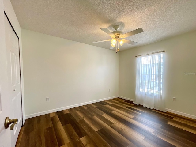 15782 SW 16th Avenue Rd, Ocala, FL 34473 - spare room featuring ceiling fan, a textured ceiling, baseboards, and dark wood-style flooring