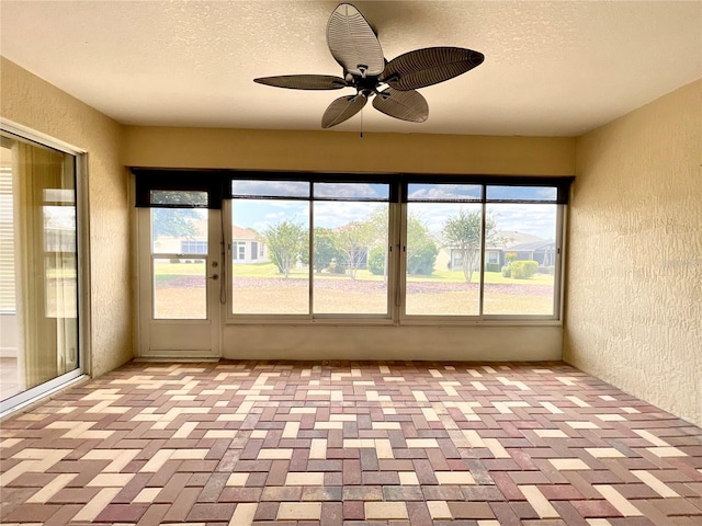 15782 SW 16th Avenue Rd, Ocala, FL 34473 - unfurnished sunroom featuring ceiling fan and a healthy amount of sunlight