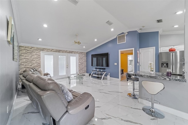 living area featuring visible vents, crown molding, and baseboards