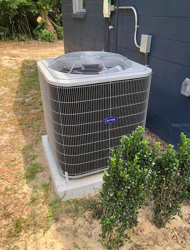 257 NE 8th St, Williston, FL 32696 - exterior details with central AC unit