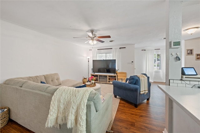 219 NW 7th St, Williston, FL 32696 - living area featuring ceiling fan and dark wood finished floors