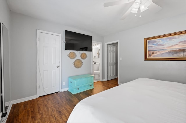 219 NW 7th St, Williston, FL 32696 - bedroom with baseboards, ceiling fan, wood finished floors, and ensuite bath