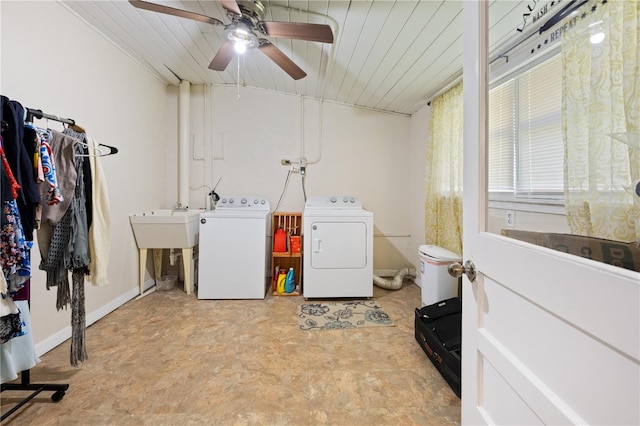 219 NW 7th St, Williston, FL 32696 - washroom with wood ceiling, laundry area, a ceiling fan, tile patterned floors, and washer and clothes dryer