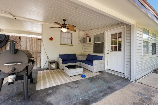 219 NW 7th St, Williston, FL 32696 - view of patio featuring a wall mounted AC, ceiling fan, fence, and an outdoor hangout area