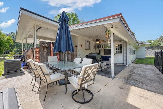 219 NW 7th St, Williston, FL 32696 - view of patio featuring ceiling fan, fence, central AC unit, and outdoor dining area