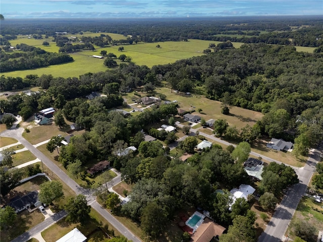 219 NW 7th St, Williston, FL 32696 - aerial view featuring a wooded view