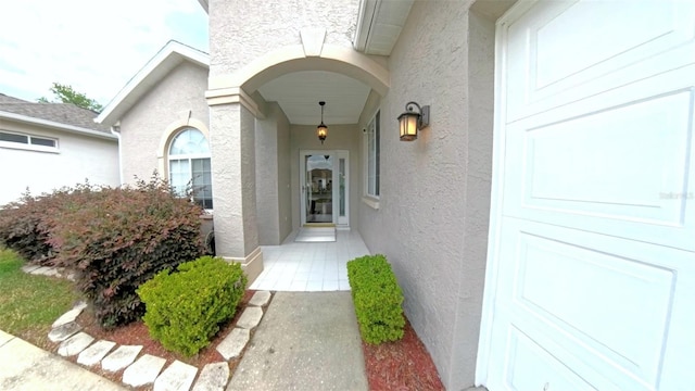 2323 NW 55th Avenue Rd, Ocala, FL 34482 - property entrance with stucco siding