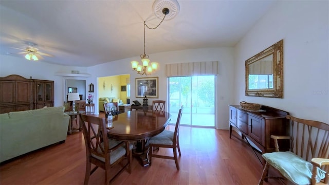 2323 NW 55th Avenue Rd, Ocala, FL 34482 - dining space featuring wood finished floors, a chandelier, and ceiling fan
