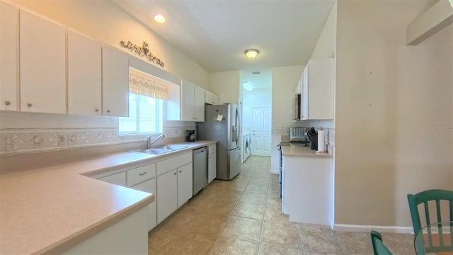 2323 NW 55th Avenue Rd, Ocala, FL 34482 - kitchen featuring a sink, stainless steel appliances, light countertops, white cabinets, and recessed lighting