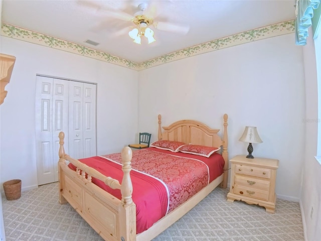 2323 NW 55th Avenue Rd, Ocala, FL 34482 - bedroom featuring light colored carpet, a closet, ceiling fan, and baseboards