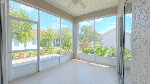 2323 NW 55th Avenue Rd, Ocala, FL 34482 - unfurnished sunroom with ceiling fan