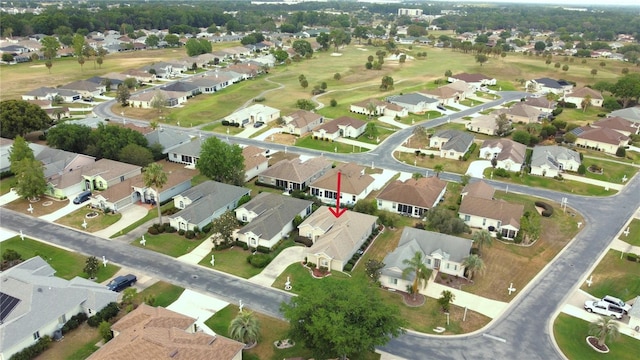 2323 NW 55th Avenue Rd, Ocala, FL 34482 - aerial overview of property's location with nearby suburban area and a golf course