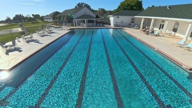 2323 NW 55th Avenue Rd, Ocala, FL 34482 - community pool featuring a patio