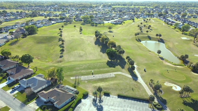 2323 NW 55th Avenue Rd, Ocala, FL 34482 - aerial overview of property's location featuring nearby suburban area, a large body of water, and a golf club