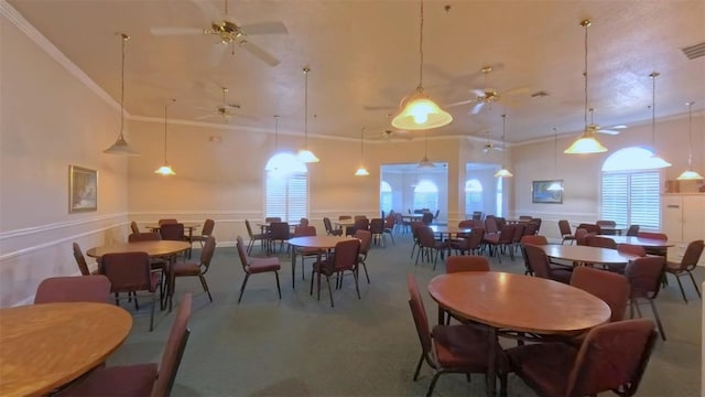2323 NW 55th Avenue Rd, Ocala, FL 34482 - dining space with a towering ceiling, ornamental molding, and carpet flooring